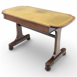 William IV mahogany library table, rectangular top with rounded edges inset with gilt and blind tooled leather writing surface, fitted with opposing frieze drawers, raised upon shaped trestle end supports united by a central upper stretcher, terminating in stylised bun feet with applied roundel bosses