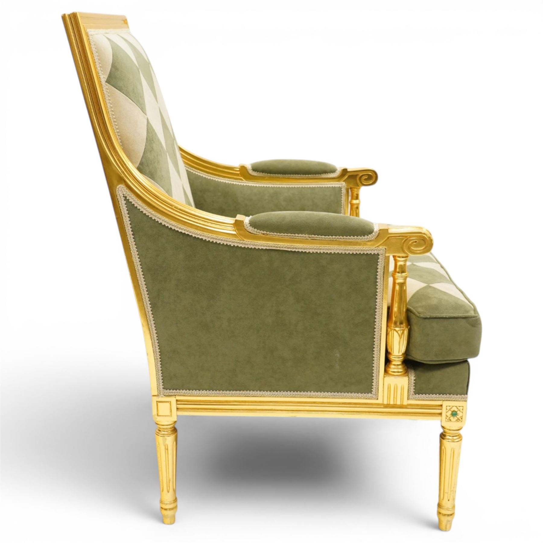 Meritalia - French Empire design gilt framed armchair, the high back over scrolled arm terminals, reeded bottom rail over fluted tapering supports, upholstered in sage green and cream lozenge patterned suede fabric with loose seat cushion
Notes: By vendor's repute originally commissioned in the 1990s by Prince Jefri Bolkiah and the Brunei royal family for use in guest suites.