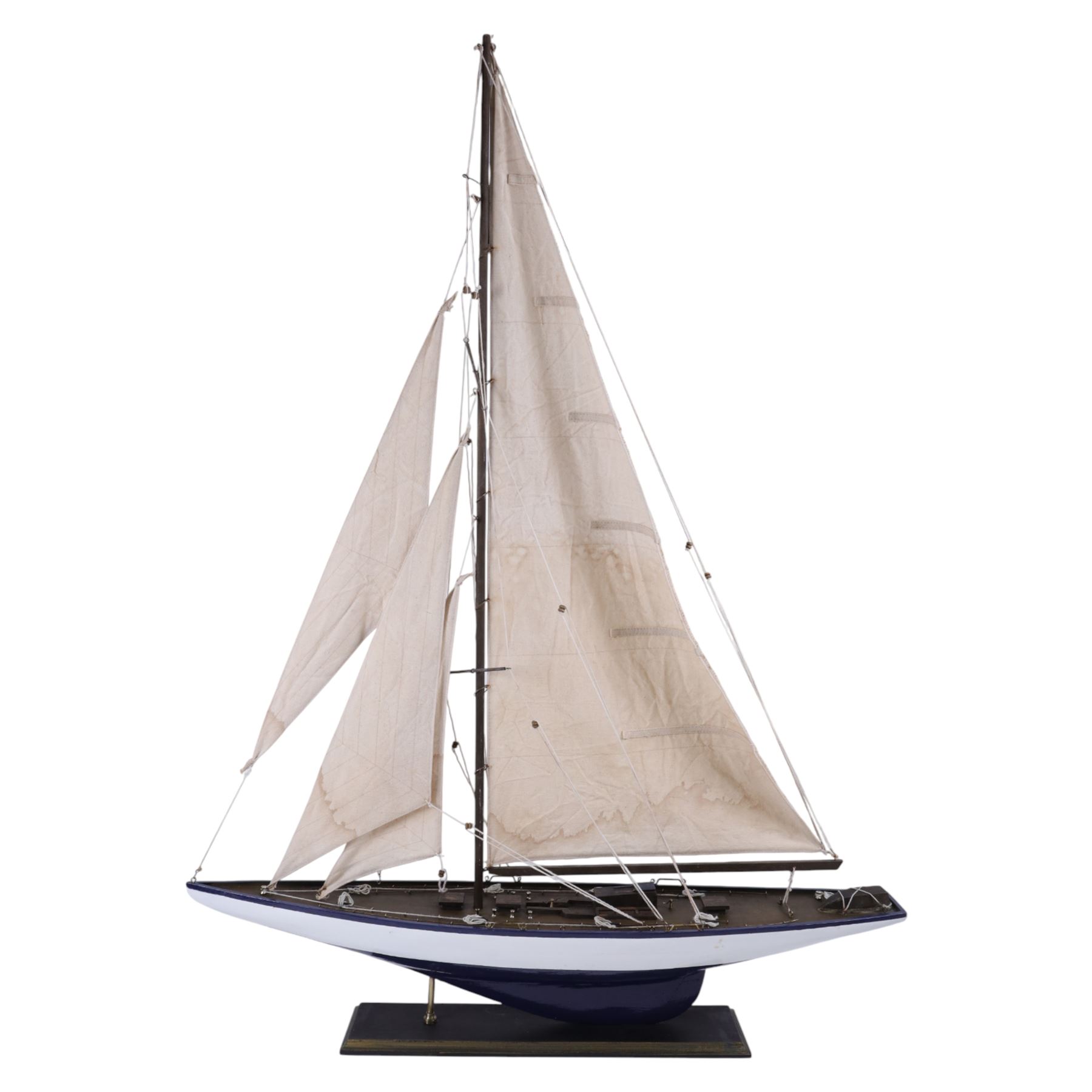 Three wooden model ships, comprising a single mast Schooner style pond yacht, a kit-built Viking longship and a model of HMS Endeavor, Schooner H117cm