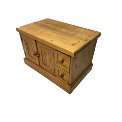 Small pine pot warmer cupboard, fitted with two panelled cupboard doors and two small drawers