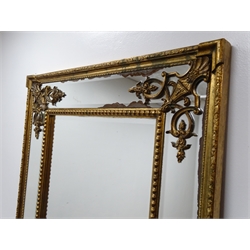  Regency style gilt framed rectangular mirror, bevelled sectional plate with bead, urn scroll and foliate detail, H184cm, W91cm  