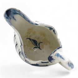 18th century Derby blue butter boat, circa 1770, of helmet form, moulded with shells and dolphin lip, on pedestal foot, H8.5cm x L9.5cm 
