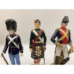 Three soldier figures comprising ‎Rudolf Kämmer Volkstedt figure of Den Kgl. Danske Livgarde, Goebel Argyll & Sutherland Highlander and 1805 Royal Horse Guards figure, together with T. Goode & Co Spode teacup and saucer decorated with the Prince of Wales feathers and the German motto 'Ich dien' teacup and saucer