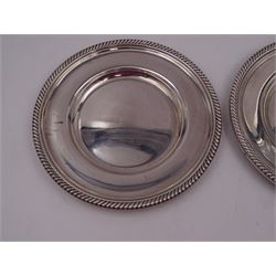 Pair of American silver dessert plates, each of circular form with oblique gadrooned rim, stamped Gorham Sterling beneath, D16.7cm