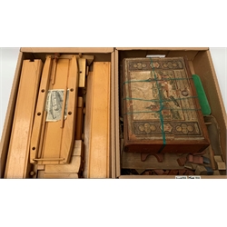 'The Bojesen Toys' beech train, ferry and bridge set, unboxed; two Edwardian Anchor-Stone wooden building sets by F.AD. Richter & Co., both in decorative wooden boxes; and a quantity of composition construction sections 