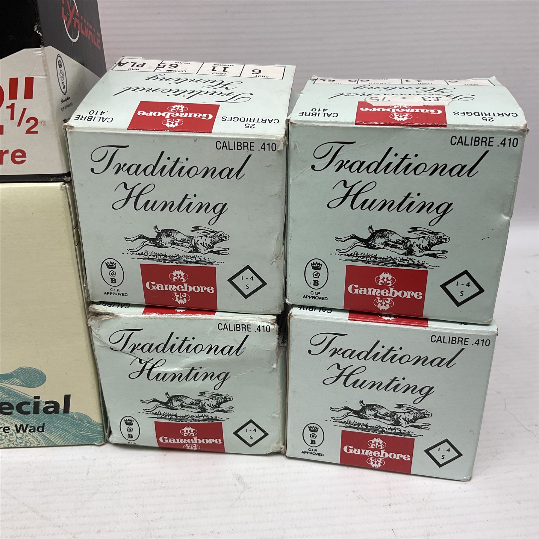 SHOTGUN CERTIFICATE REQUIRED - AMMUNITION - one-hundred and seventy-six 12-bore shotgun cartridges, boxed and in a leather cartridge belt with pouch; together with ninety-five .410 cartridges (seventy-nine 65mm and sixteen 50mm) in boxes