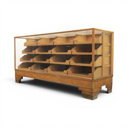 Dudley & Co - early 20th century oak framed and glazed haberdashery shop counter, fitted with sliding tray drawers