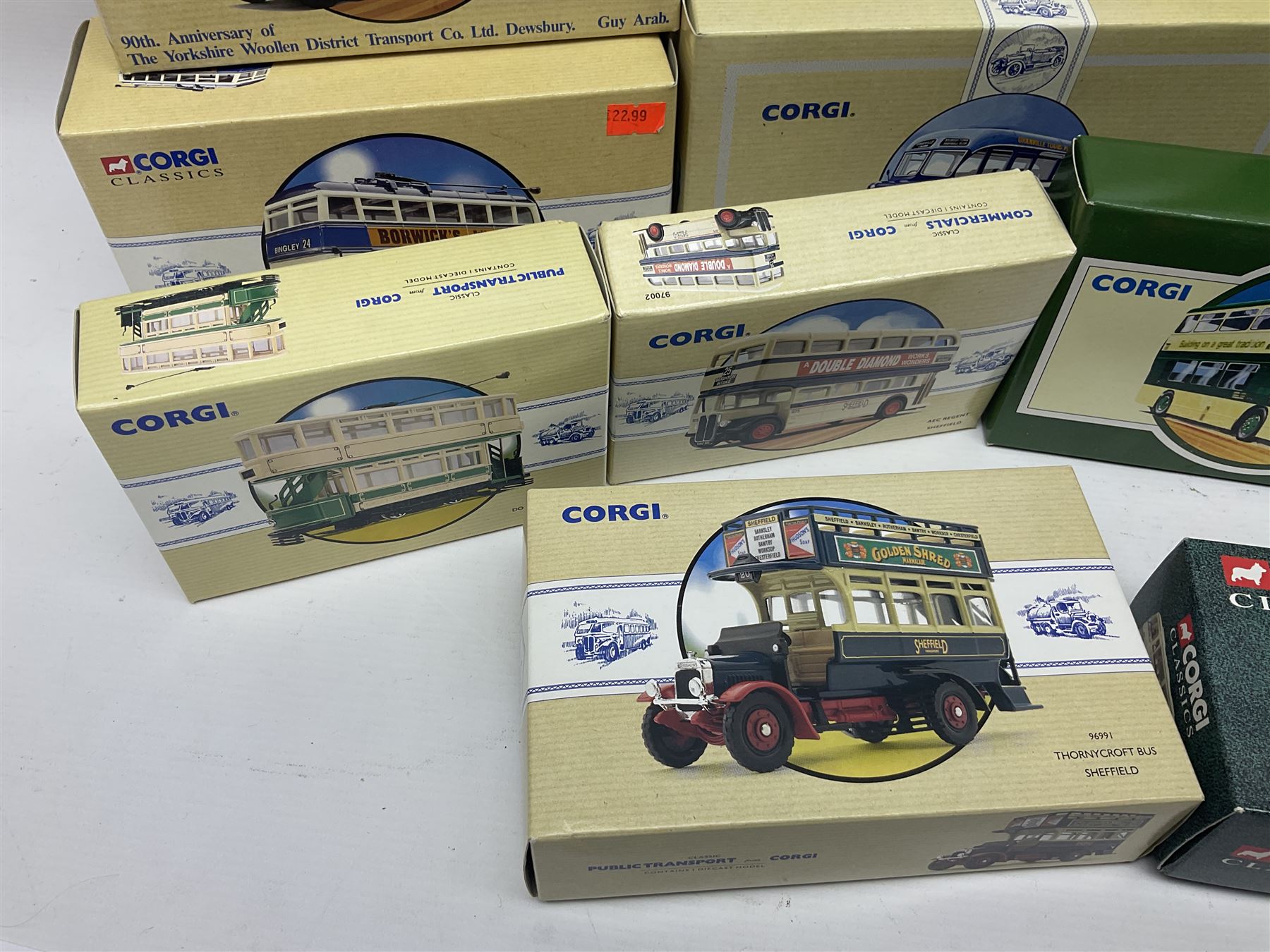 Corgi - twenty eight modern die-cast model coaches, buses and wagons to include Corgi Classics 35305, 96991, 97002, two 97108, 97208, 97267, 97335, 97871 and 98162; limited edition sets D949/26, 97107 and 97185; The Yorkshire Rider Series 91700, 91853, 91858 and 91862; all but one in original boxes or perspex display cases, most with certificates (27)