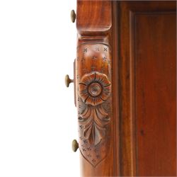 Victorian design mahogany Davenport desk, the sloped writing surface inset with tooled green leather and hinged to reveal a fitted interior, with a pen compartment to the raised gallery back, four drawers to each side, on carved scrolled supports with acanthus detail, raised on turned feet