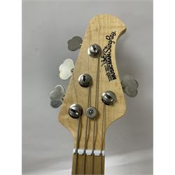 Ernie Ball Music Man Sting Ray 4 string bass guitar, in natural finish with roasted maple neck and tortoiseshell effect scratch guard, serial no 87485, in black Music Man hard case, guitar L114cm