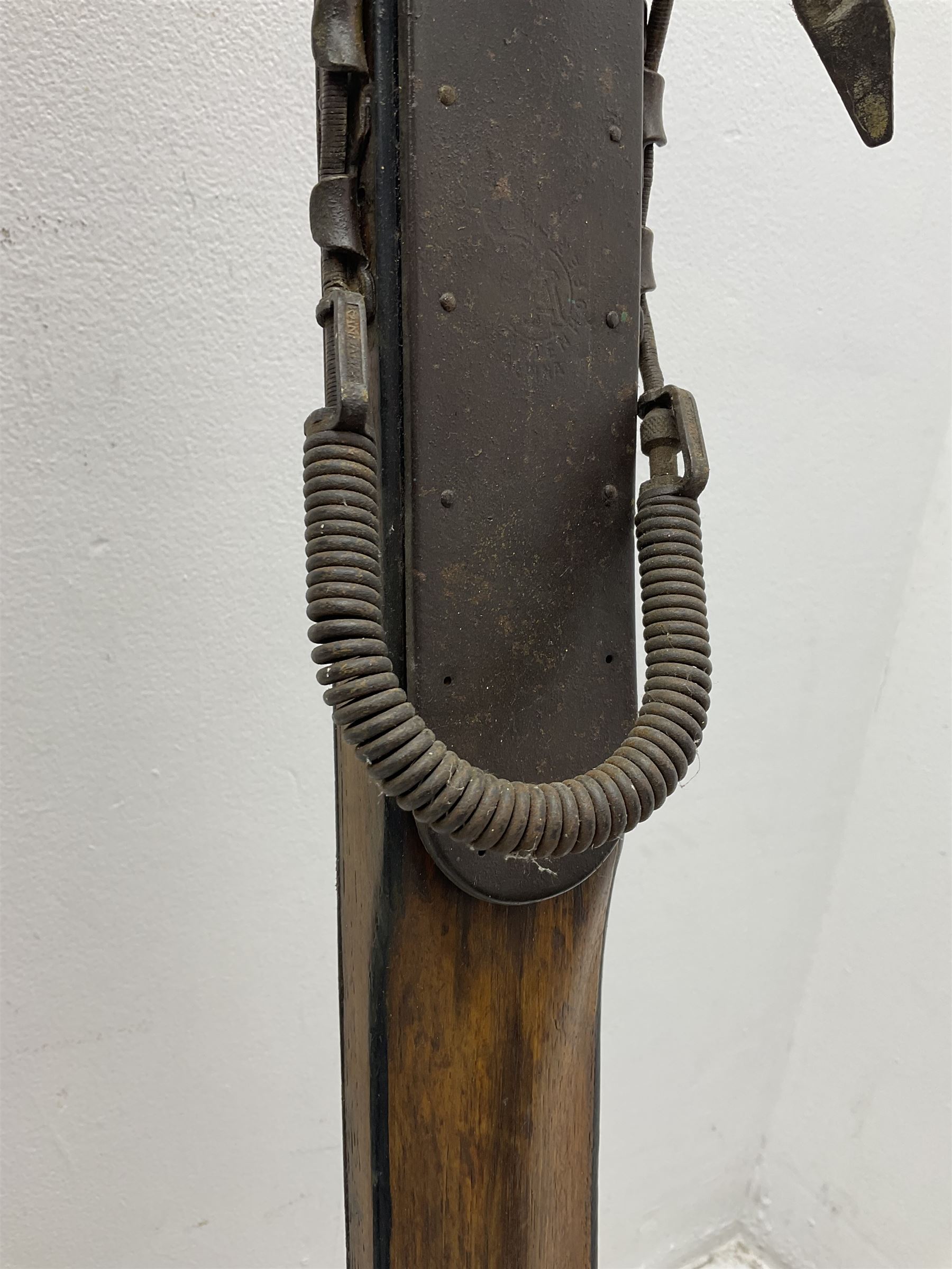 Pair of 1930s wooden skis, with painted metal runners beneath stamped Attenhofer, with retailers label for Ernst Gertsch Central Sports, L206cm