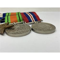 WWII group of five medals comprising 1939-45 War Medal, Defence Medal, 1939-45 Star, Africa Star and France and Germany Star on wearing bar; WWI British War Medal awarded to 142019 Pte. A. Thompson A.S.C.; and boxed King's Badge 'For Loyal Service'
