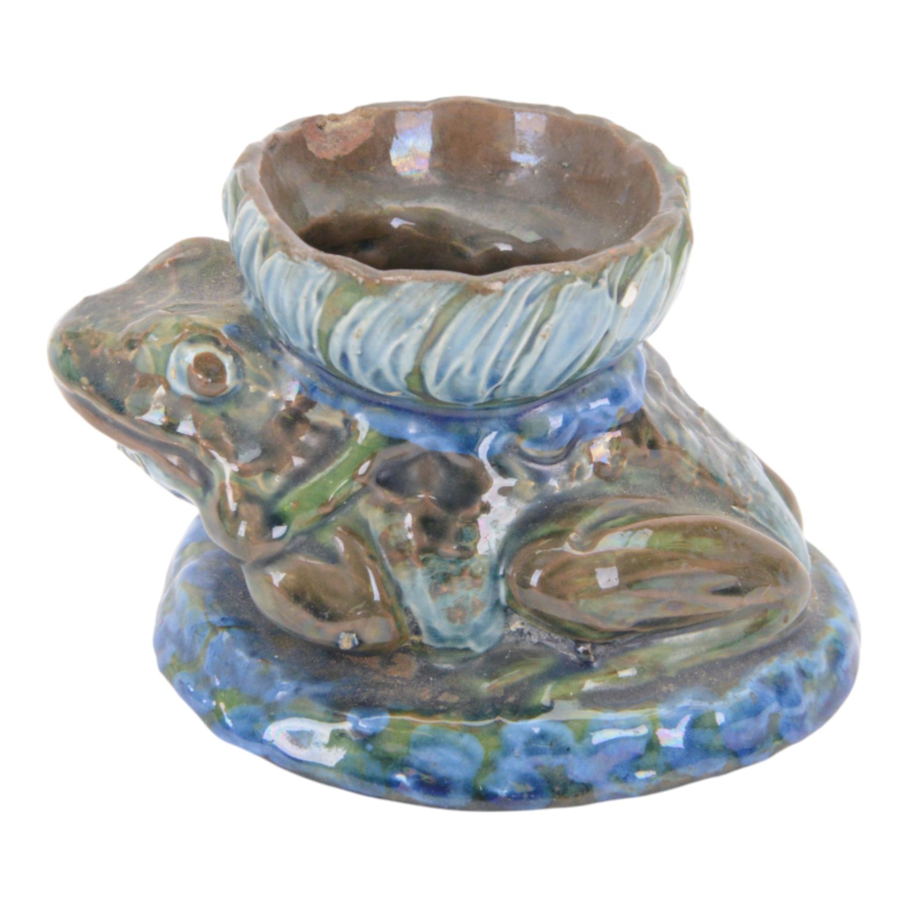 C. H. Brannam pottery Candle holder modelled as a Frog, with  flower upon its back, with signature to base, H8cm 