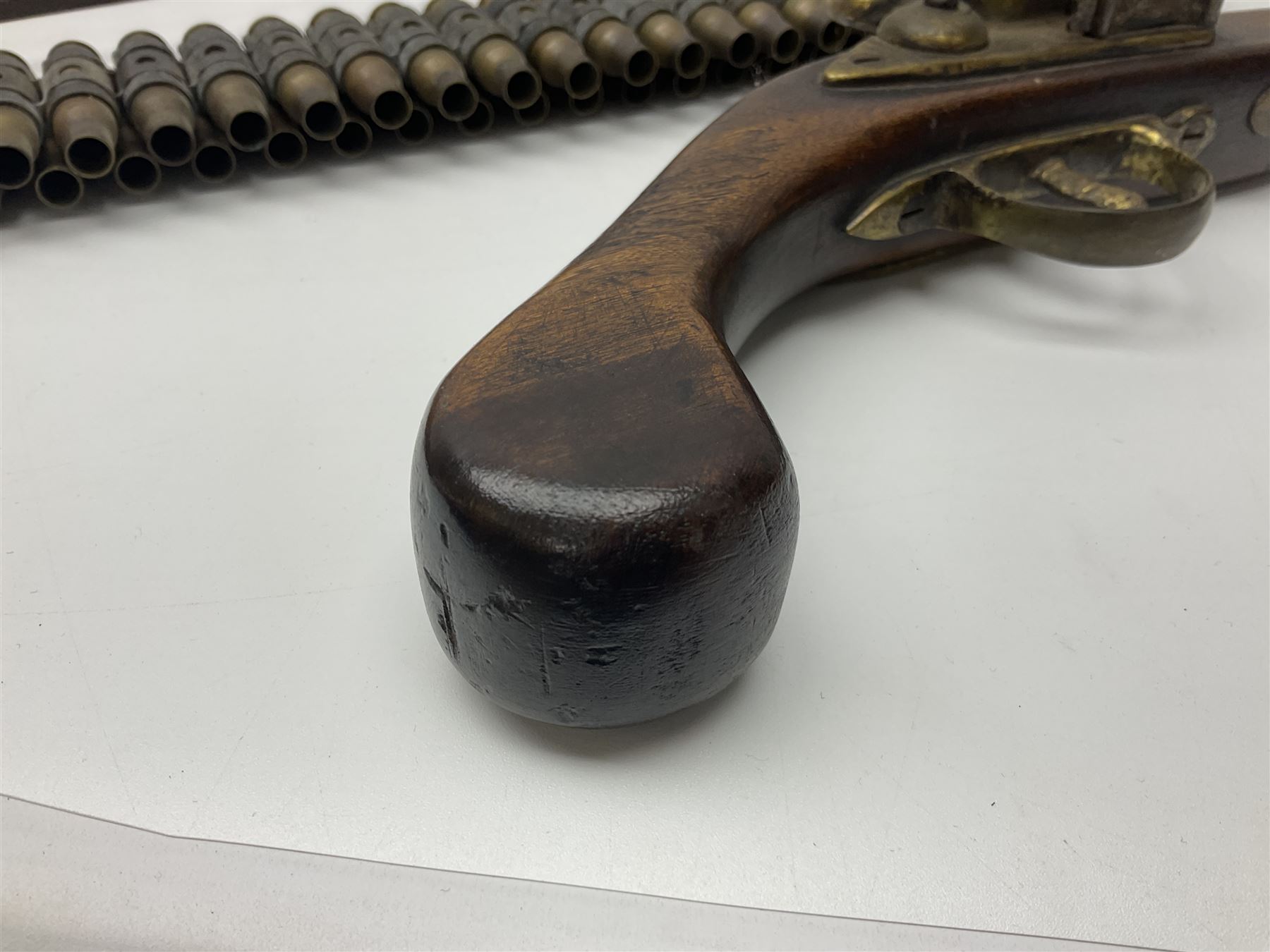 Leather covered swagger/sword stick with 40cm steel blade L62cm overall; another ash sword stick with 30cm diamond section steel blade; pair of fencing foils, the blades marked Solingen; two reproduction flintlock pistols; and 92cm inert cartridge belt (7)