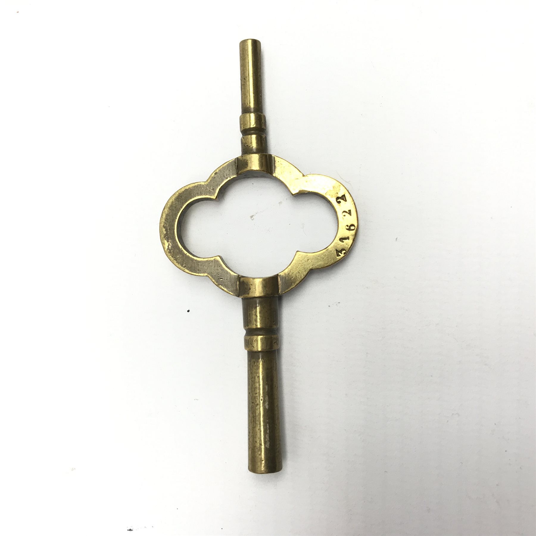 Early 20th century brass five glass carriage clock with button repeater, the brass case engraved with trailing foliage decoration, white enamel Roman dial, eight day movement striking the hours on bell, inscribed 'J. T. Ellsworth from... J. Blundel, Crosby Hall', with key, H14cm