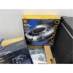 Large quantity of camera equipment in three boxes - Lumix GX1 camera, Canon EOS 500 camera, Lumix FZ100 camera, Pantax  MZ5n, various other cameras, Swift spotting Scope 20 x 60 in box,  Maxtor hard drive, three tripods, Kodak carousel projector, Pradolux slide projector, a selection of camera bags and other camera equipment. 
