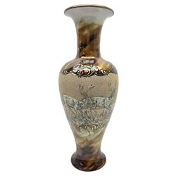 Late 19th century Doulton Lambeth sgraffito vase decorated by Hannah Barlow, of baluster form with waisted neck and flared rim, decorated with a central sgraffito band of deer between scrolling borders, against a mottled brown glazed ground, with impressed and incised marks beneath including monogram, H46cm