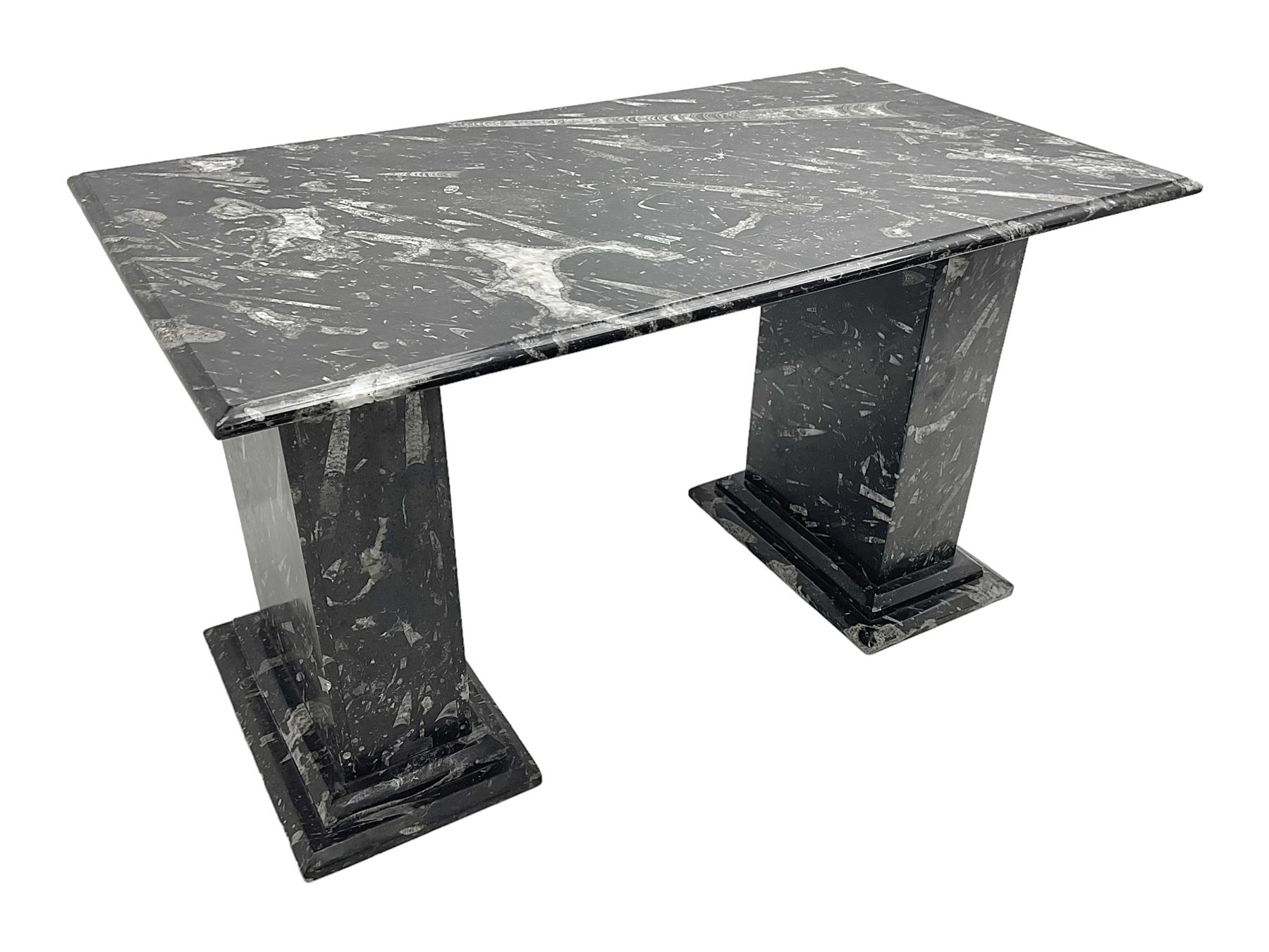 Marble hall table with orthoceras and goniatite inclusions, the rectangular top upon two rectangular stepped plinths, H75cm, L135cm, D78cm 