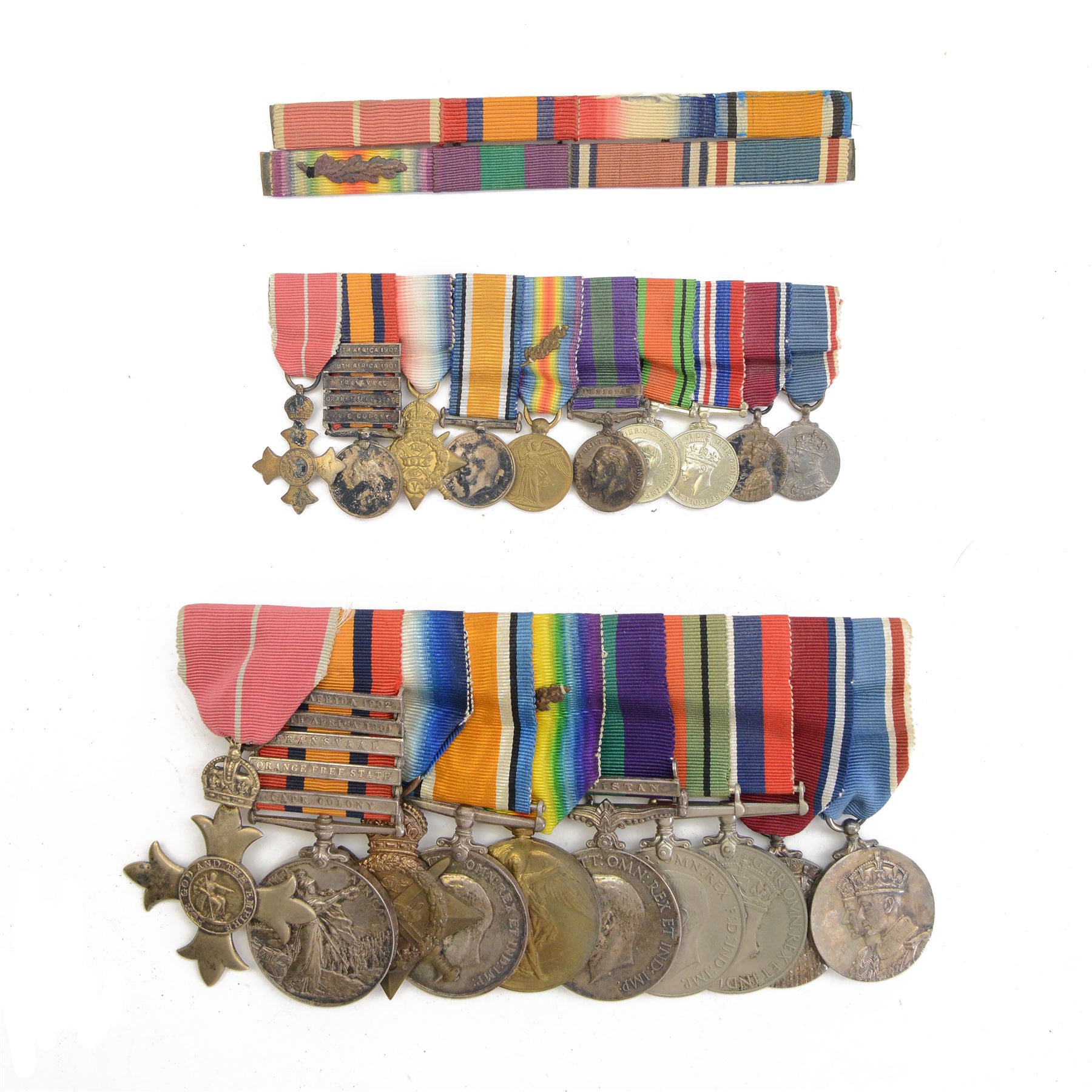 Group of ten medals awarded to Major P.T Sanders; George V OBE, Queens South Africa medal with five clasps Cape Colony, Orange Free State, Transvaal, South Africa 1901 and South Africa 1902, 1914 Star, WWI British War medal, Victory medal with M.I.D. oak leaves, General Service medal with Kurdistan clasp, WWII Defence medal, 1939 - 1945 medal, King George V Jubilee medal and George VI Coronation medal, together with matching miniature medal set and ribbon bar, Moise Dreyfuss stop watch Mk II, no.3907, PT Sanders bible from 24th company 8th battalion Imperial Yeomanry, photographs and other military items    
