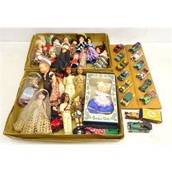  Quantity of National Costume dolls, two board mounted Die Cast models & two other diecast vehicles   