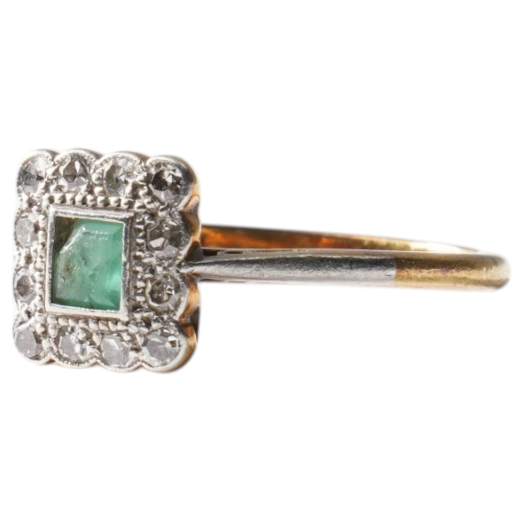 Early 20th century gold emerald and diamond cluster ring, stamped 18ct & Plat