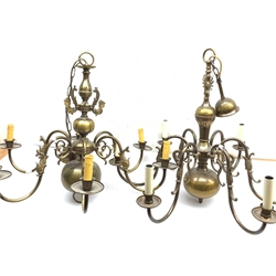 Two brass Flemish style chandeliers, each with six curved branches detailed with fish, largest H63cm. 
