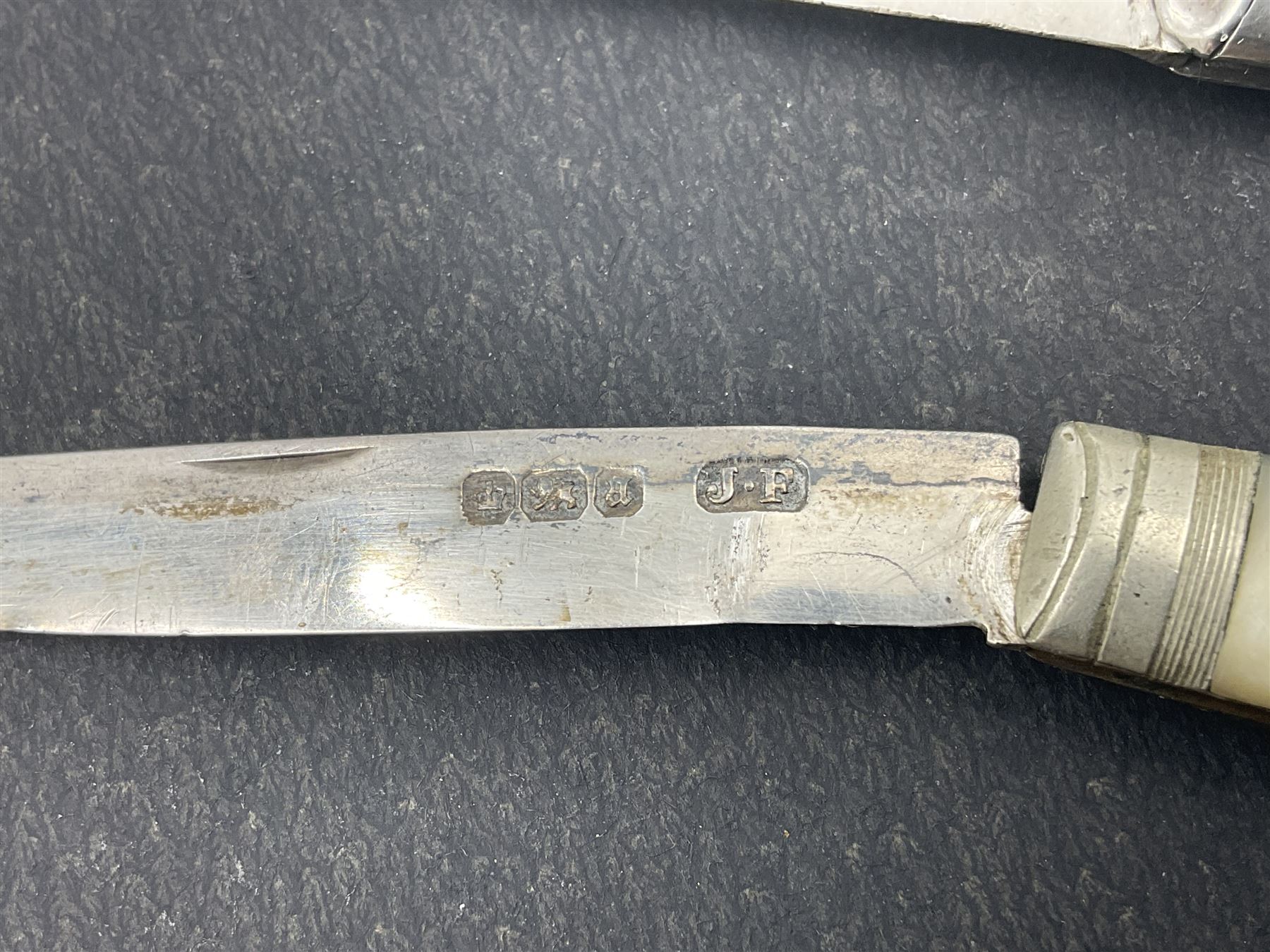 Two silver fruit knives with mother of pearl handles, hallmarked, mother of pearl tokens and similar items 