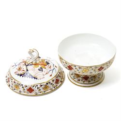 Early 19th century Bloor Derby dinner wares, c.1800-1825, Asian Rose pattern, comprising five small plates, one circular tureen, and three covered surrounding dishes, crossed sword marks in red to base, plates D20cm, circular tureen 24cm  
Provenance: property of a Nobleman