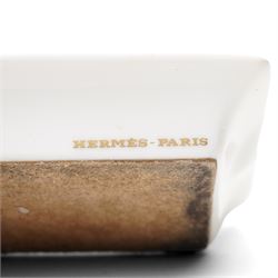 Hermès - set of four miniature porcelain ashtrays, each decorated with a horse in differing blanket, with gilt and coloured borders, in contrasting colour with various horse-coats, in original fitted box