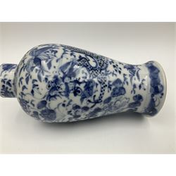 Late 19th/early 20th century Chinese blue and white vase and cover, of baluster form, the body painted with dragons amidst flowers, the domed cover with foo dog finial, with Kangxi character mark beneath, H22cm