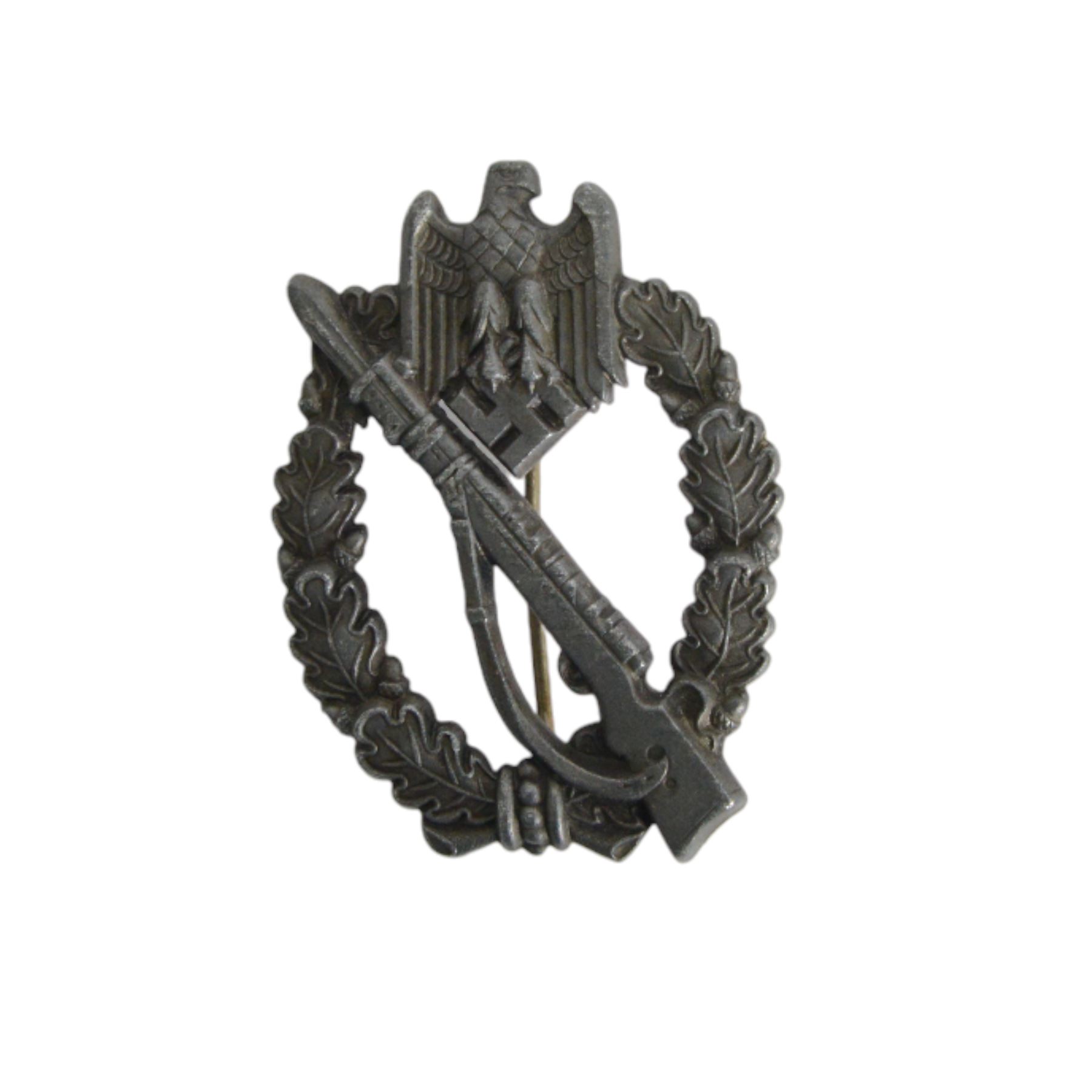 Two Third Reich WWII German assault badges, Infantry and General, together with American paratrooper jump wings