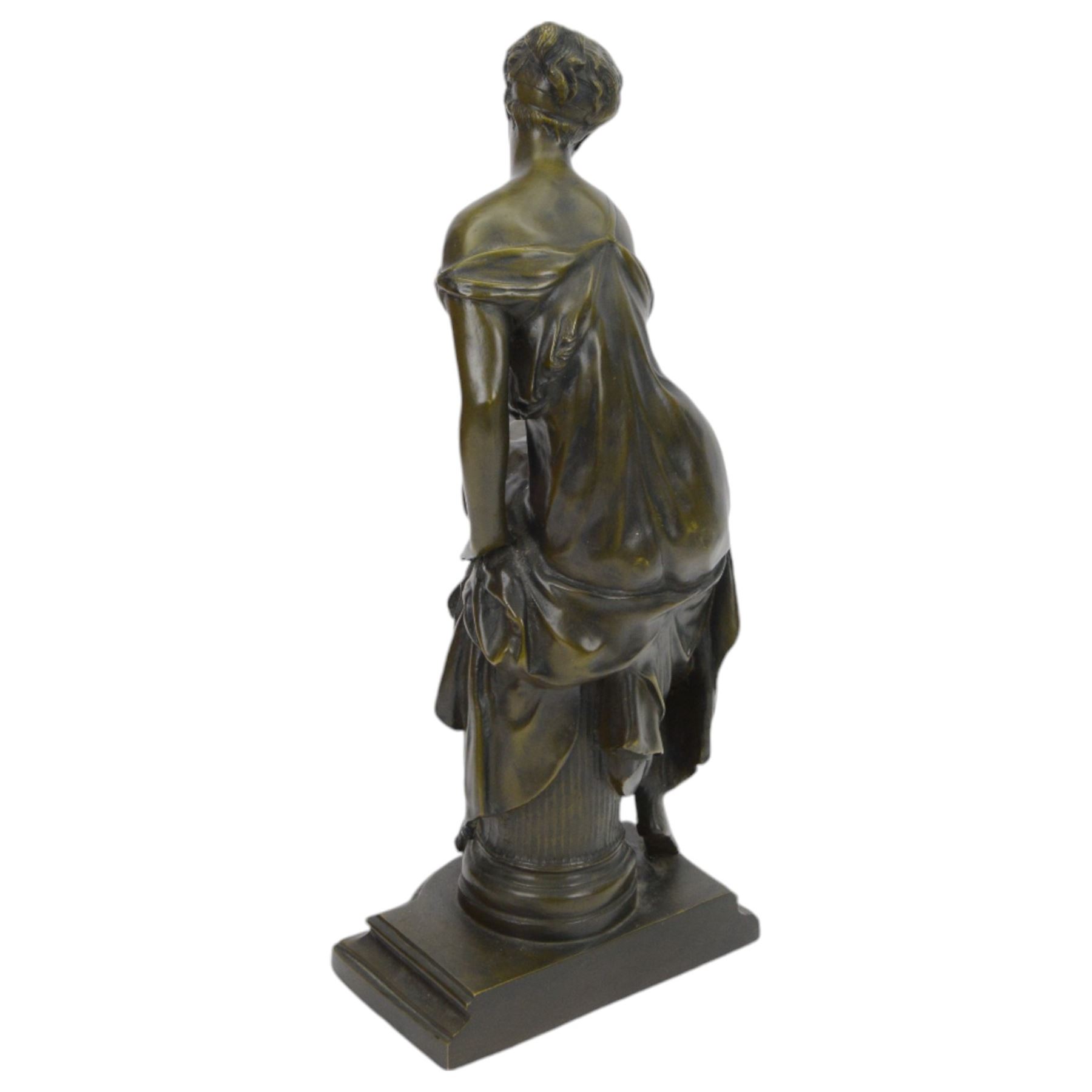 After Joseph Charles De Blezer, bronze figure modelled as a woman in neoclassical dress seated upon a column, H45cm