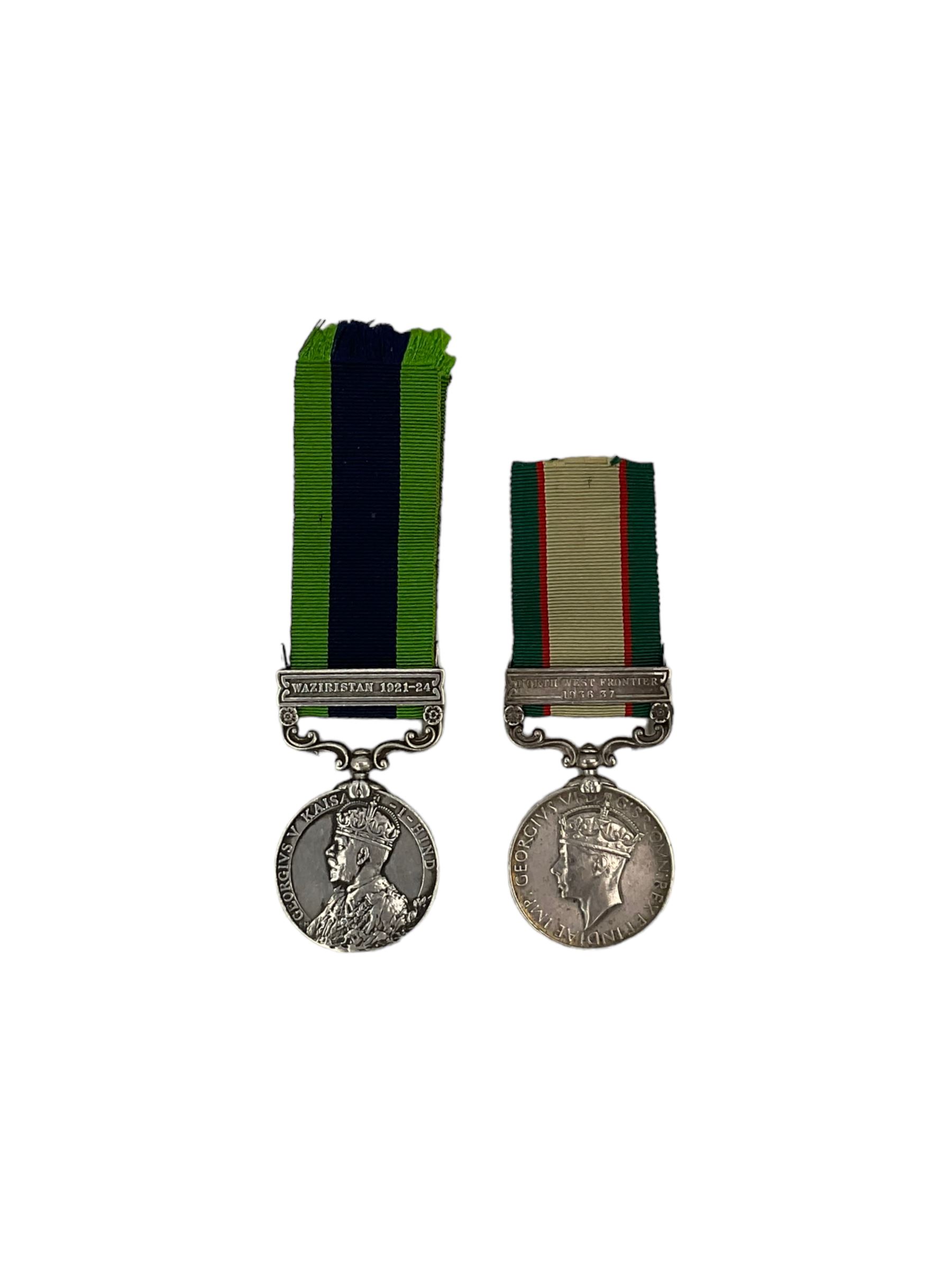 India General Service medal with Waziristan 1921-1924 bar to Rifleman Narba Hadur Thapa, Gurkhas and another with North West Frontier 1936-37 bar to 12212 Sepoy Izzat Shah, 3.12 Frontier Force Regiment (2)