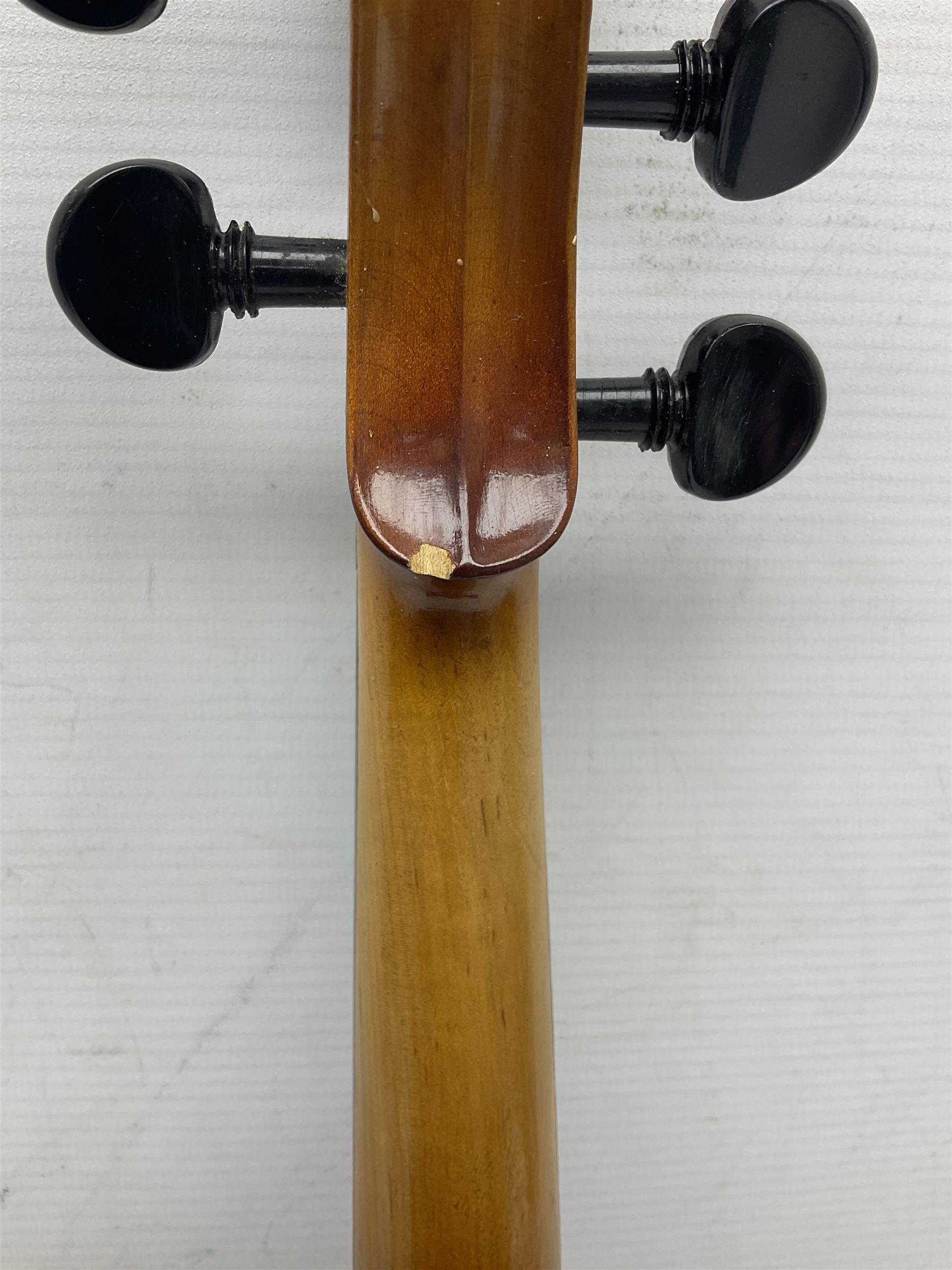 Chinese Parrot violin with 35.5cm two-piece back; L59.5cm in carrying case; and early 20th century German violin for restoration; bears label 'Antonius Stradivarius Faciebat Anno 1730'; cased with bow (2)