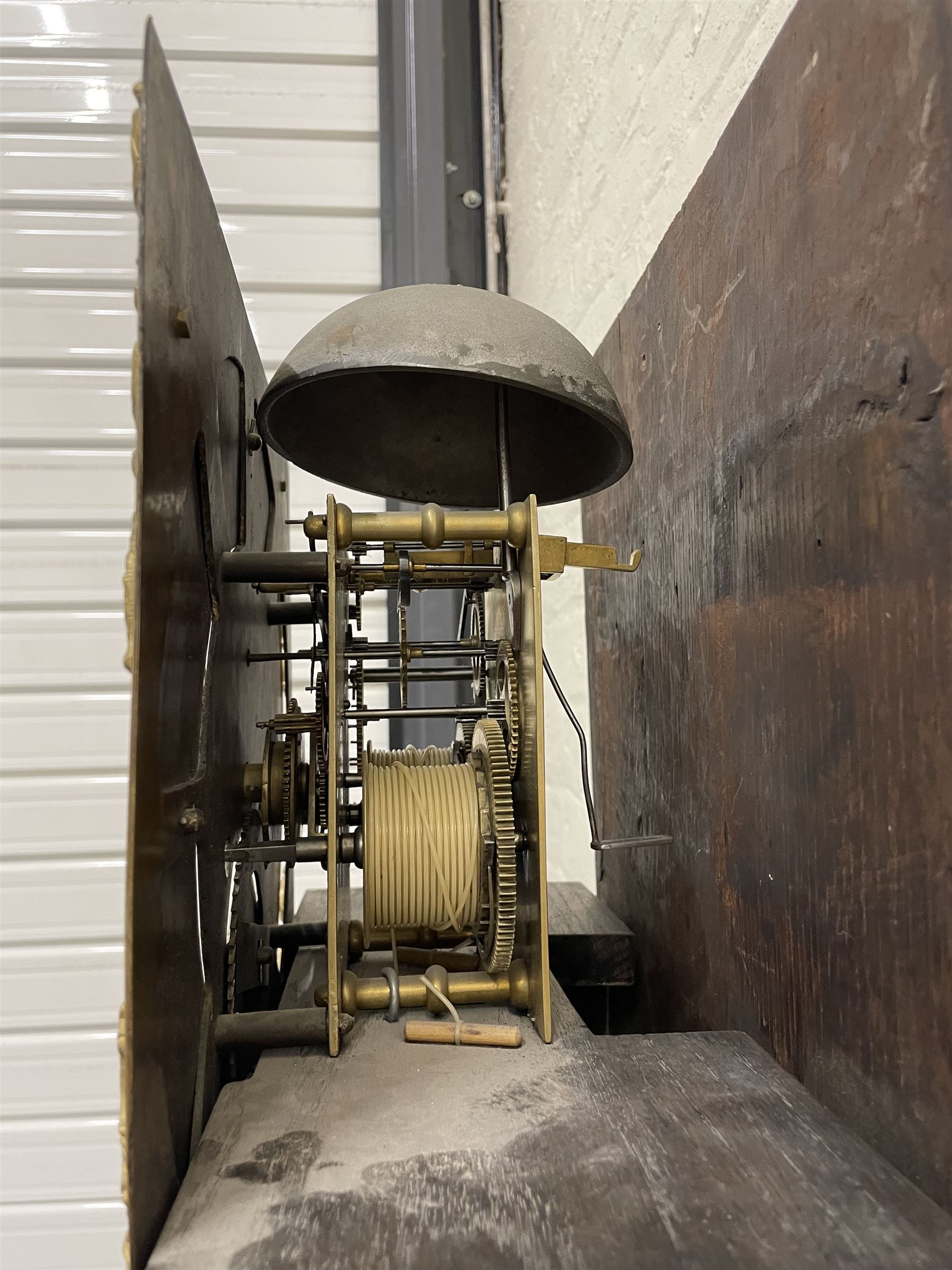 William Watson of  Blackburn (Lancs)  - late 18th century 8-day oak and mahogany cross banded longcase clock, with a flat top and open fretwork above, deep cornice with dogtooth moulding and frieze beneath, square hood door flanked by reeded pilasters with brass capitals, trunk with  reeded quarter columns, long trunk door with concave corners on a plinth with canted corners on bracket feet, brass dial with cast brass spandrels, broad silvered chapter ring with Roman numerals and five-minute Arabic's, a profusely engraved and silvered dial centre with seconds dial, matching steel hands and calendar aperture, hourly rack striking movement with a recoil anchor escapement. With weights, pendulum and key. 
William Watson of Northgate, Blackburn, is recorded as working c1770-1814 . As with this clock Watson frequently signed some of his clocks without a placename.
