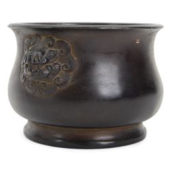 Chinese bronze censer, of circular bellied form with temple lion mask handles, upon a circular foot, with apocryphal six character Xuande mark within a border of two dragons chasing a pearl, H7.5cm D10/5cm
