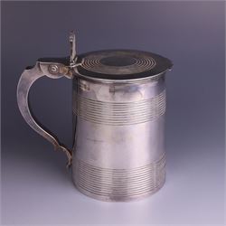 George III silver lidded tankard, with two ribbed bands to the cylindrical body, the hinged lid with concentric circle to cover and pierced thumbpiece, hallmarked Charles Fox I, London 1816, including thumb piece H16cm