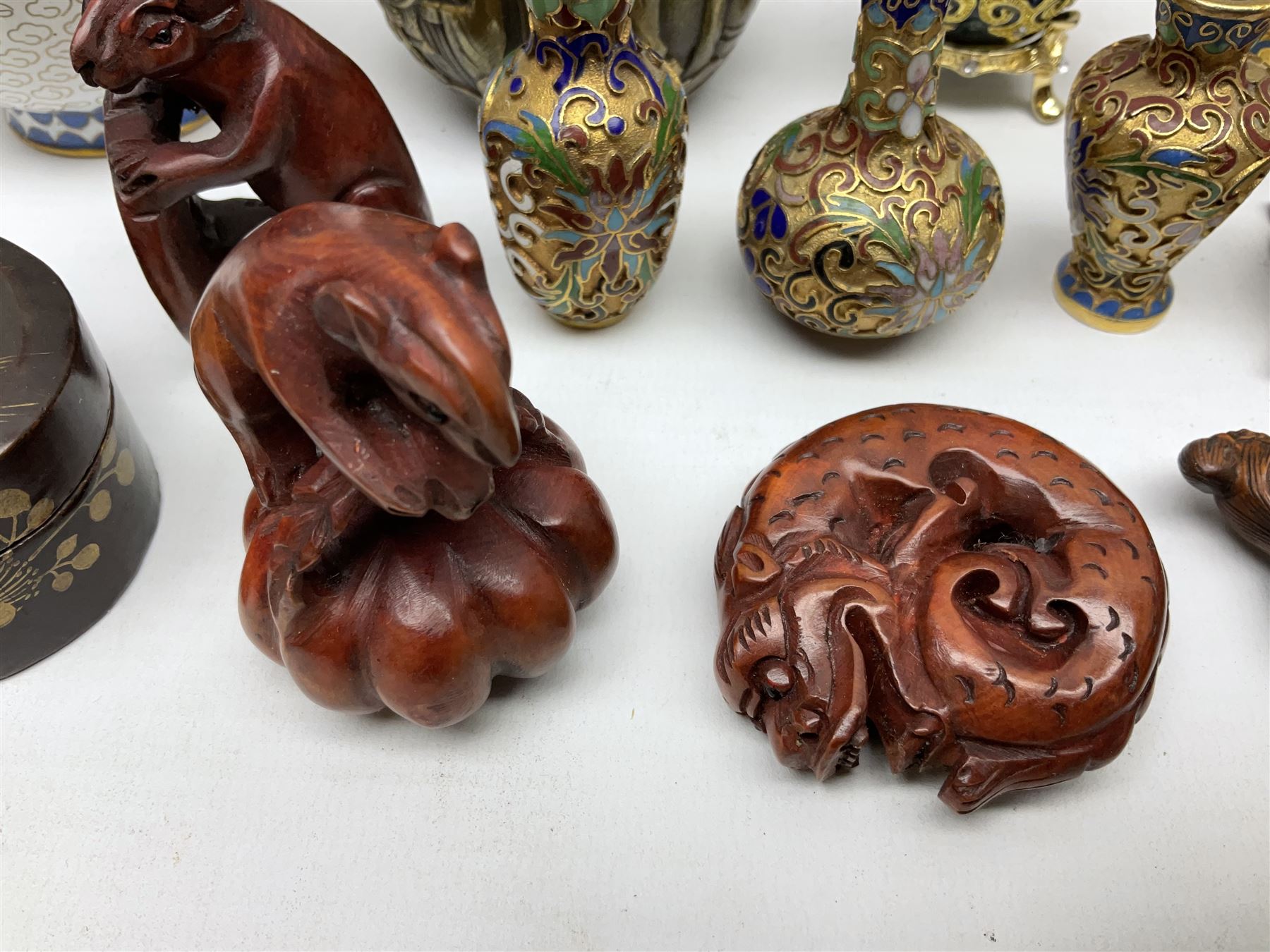 Chinese bronze peach of immortality and longevity, cloisonné vase of baluster form and three miniature cloisonné vases, six Netsuke modelled as monkeys, dragon etc