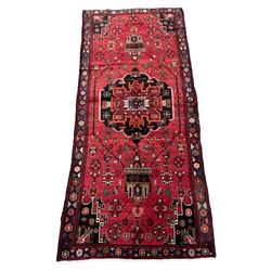 Persian Hamandan rug, red ground field decorated with large central medallion, stylised flower heads and bird motifs