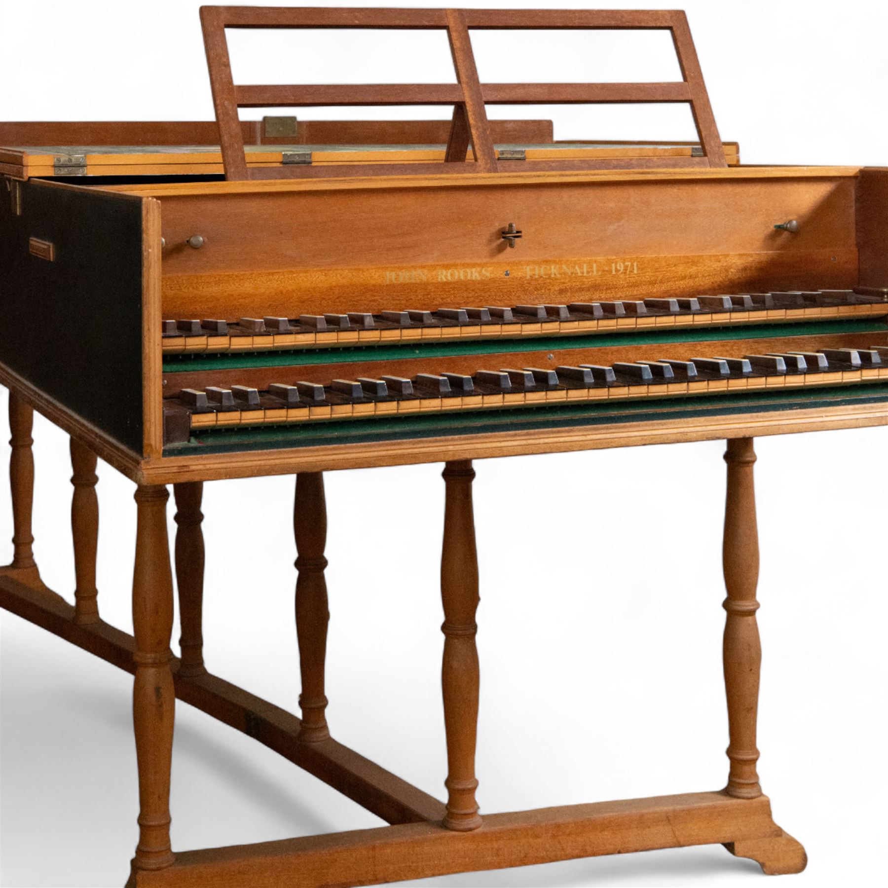 20th century “French style” Two manual Harpsichord by John Rooks of Tincknall (1971).
Double manual keyboards with three sets of strings: Two Unison, one octave and “buff” stop. Black outer casing with gold banding, five octave keyboards with 63 keys E1-G6, with black naturals and synthetic covered white sharps, inner lid painted with a rural scene, with adjustable music desk. Soundboard, bridges, strings and synthetic jacks in good condition with just one small crack to the treble area of the soundboard, key action with reasonable repetition and damping but in need of some regulation, case raised on turned baluster supports.

 You can find and listen to an example of Alan Cuckston playing this particular Harpsichord in the link below:
The King’s Hunt by John Bull

Given the intricate nature of these historic instruments, specialist support will be available if required, to assist successful buyers with safe removal and onward handling. Price upon application. 

