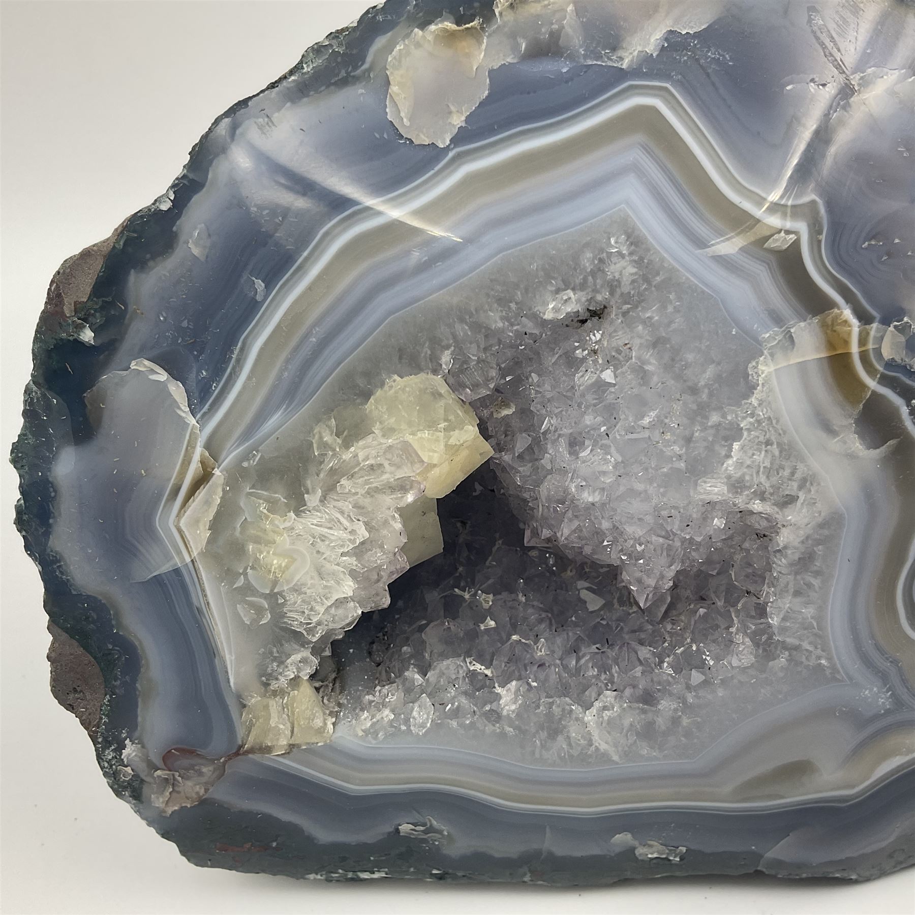 Amethyst crystal geode cluster, with well-defined crystals of various sizes, in purple tones, H12cm 