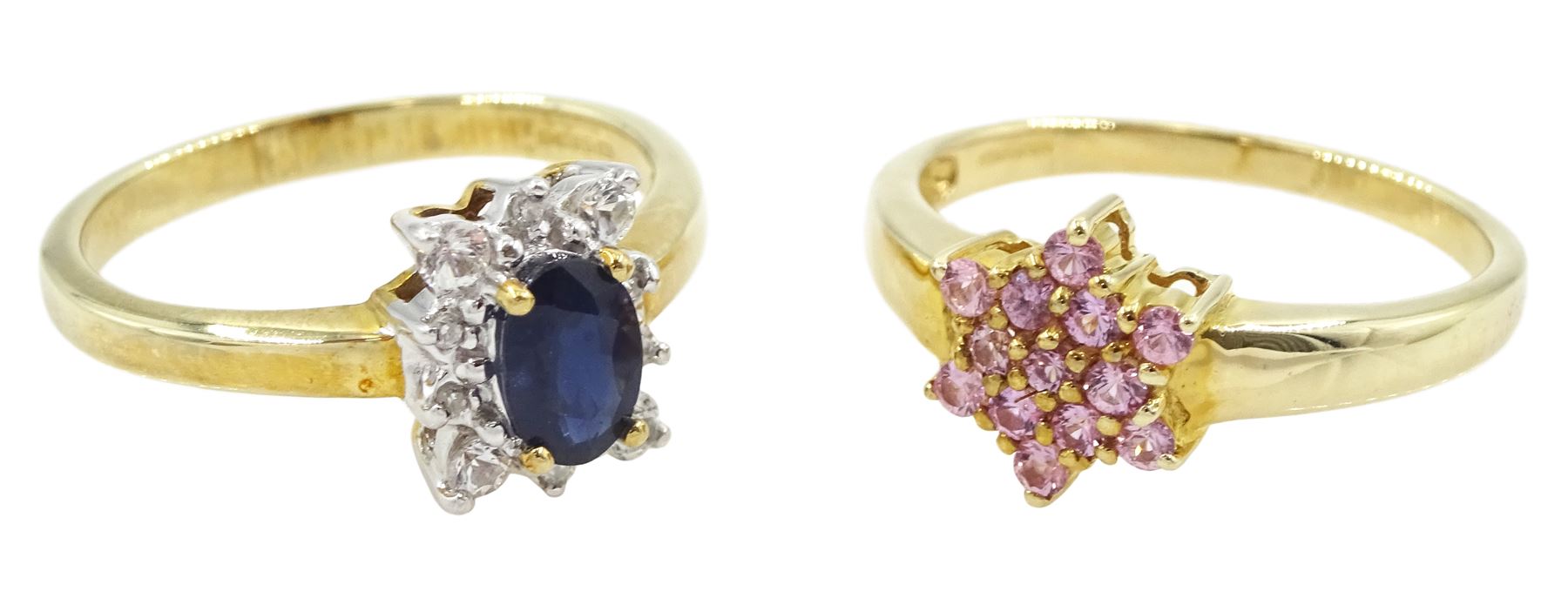 Gold oval cut blue and round cut white sapphire cluster ring and a gold pink sapphire cluster ring, both hallmarked 9ct