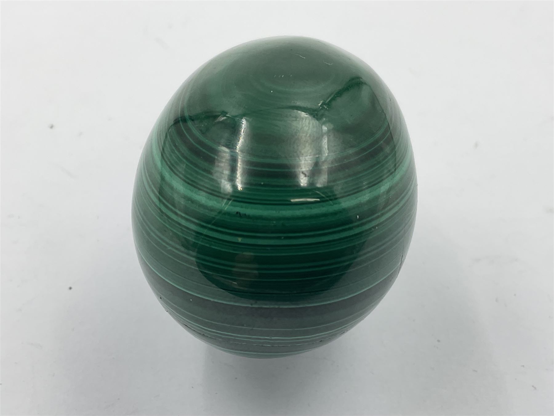 Three malicate specimen eggs, originally part of the collection of the late Stanley J Seeger, largest H7cm