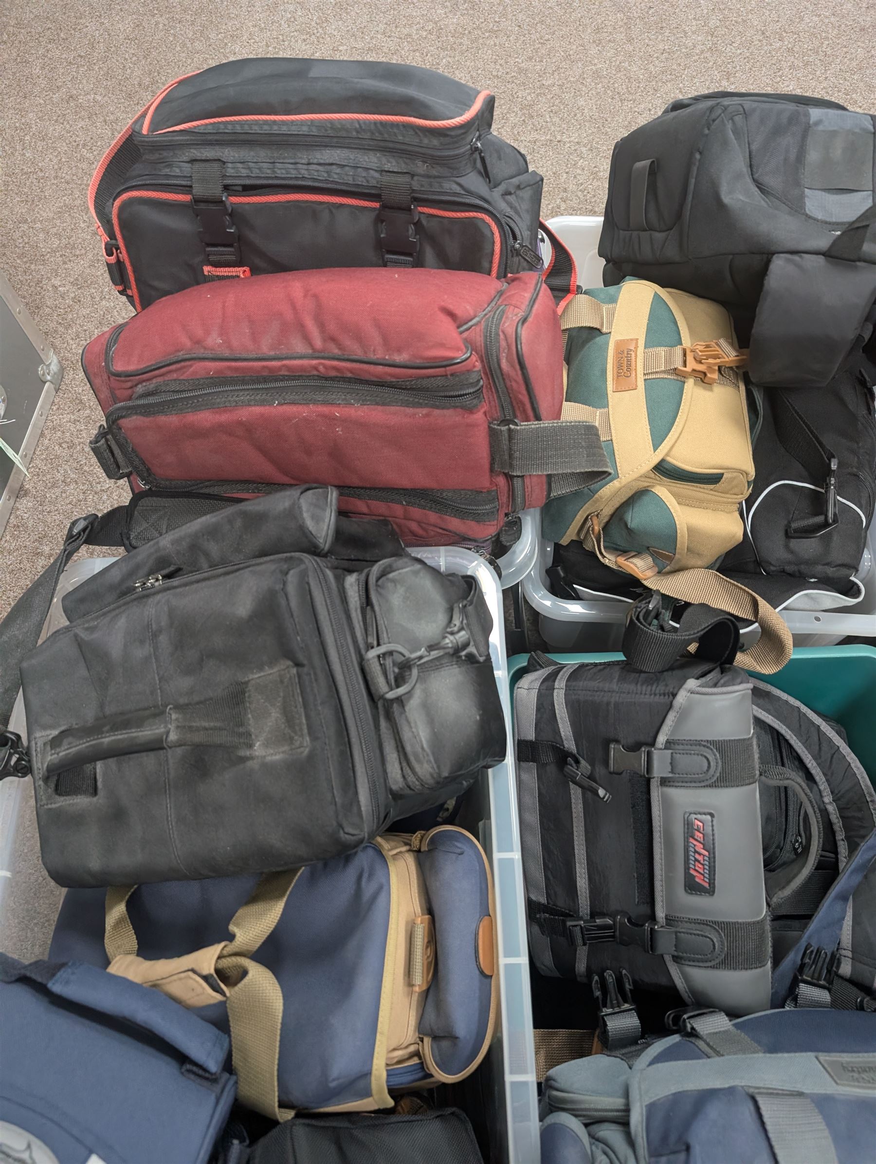 Large collection of camera bags and carry cases, including Lowepro, Town & Country, Nikon, Centon, Swordfish examples, in four boxes