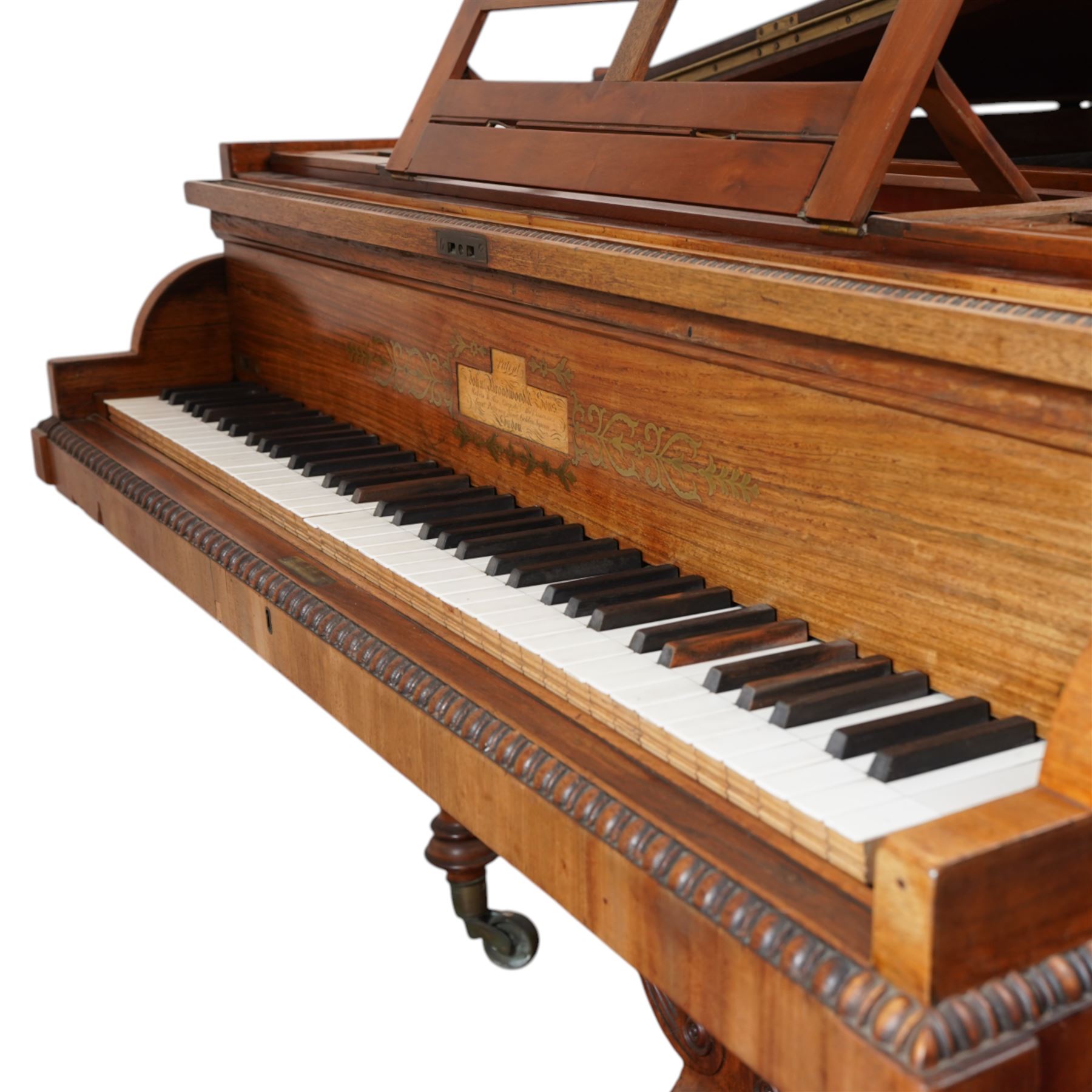 Early 19th century Grand Piano by John Broadwood & Son, London 1828.
Straight strung Broadwood “Barr Frame” Grand Piano with four steel braces from the wrest plank to the brass hitchpin plate. Partially re-strung with one string missing and some tuning pins loose, bridges in good condition, soundboard with cracks, action requires some adjustment and attention, six octave keyboard, with 73 keys C1-C7, with ivory naturals and ebony sharps, Lyre with sustain and una-chorda pedals, mahogany case with brass inlay and makers name to the double key-fall, adjustable open lattice music desk with egg and dart moulding to the surround of the case and lid, raised on reeded and tapered legs with castors. 

 You can find and listen to examples of Alan Cuckston playing this particular Broadwood Grand Piano in the links below:
Trio in D Minor Op. 25 by Francis Edward Bache
Gladiolus Rag by Scott Joplin
Sonata for Violin and Piano No.1 in G Minor by George Frederick Pinto

Given the intricate nature of these historic instruments, specialist support will be available if required, to assist successful buyers with safe removal and onward handling. Price upon application. 


This item has been registered for sale under section 10 of the APHA Ivory Act Submission Reference: 1N7BA84E
