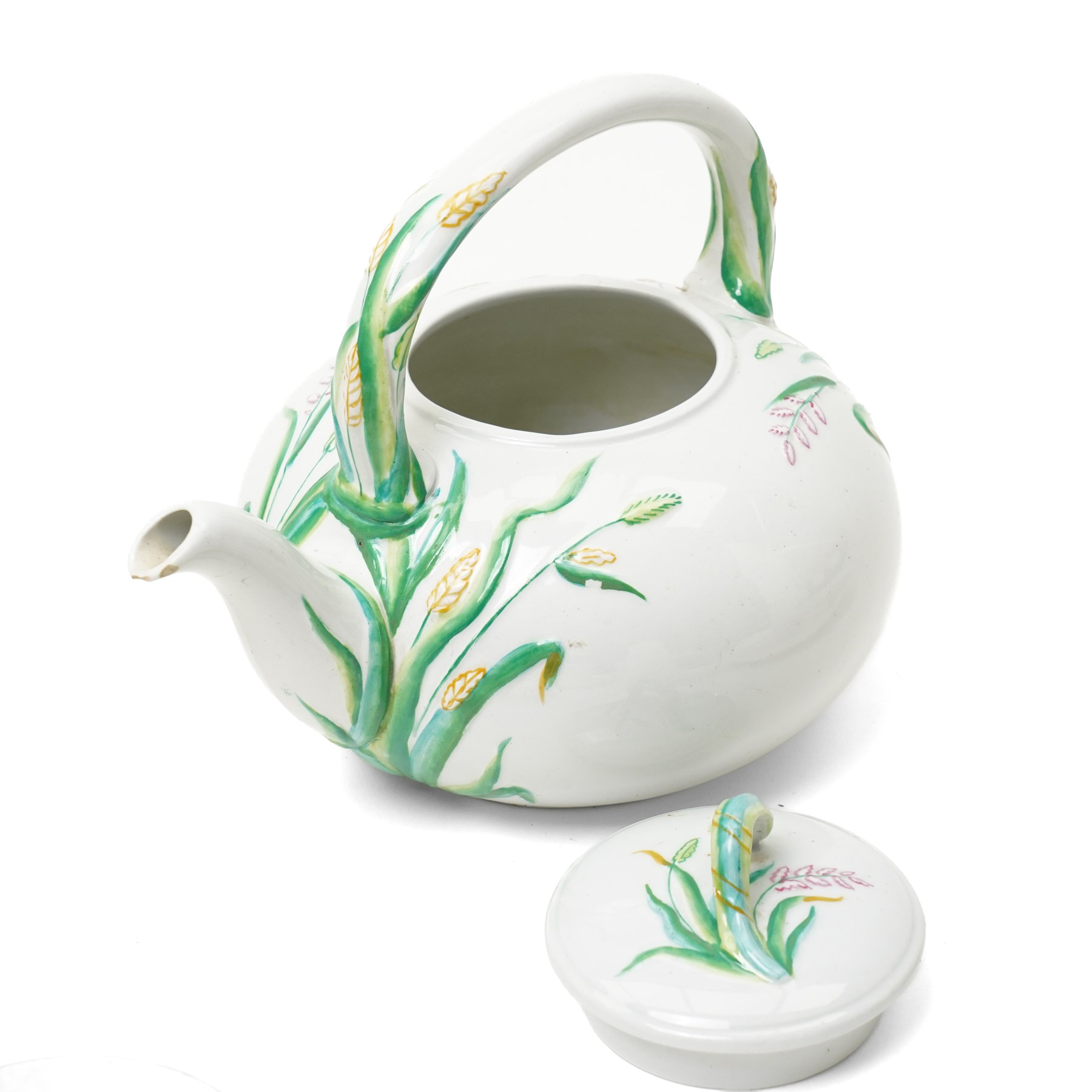 Victorian Copeland part tea service, painted in a Spring pattern with hay and flowers, comprising nine teacups and eleven saucers, teapot, milk jug, two large serving plates and three smaller and twelve side plates