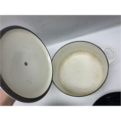 Le Creuset cast iron casserole dish, together with two Waterford cast iron dishes and a frying pan