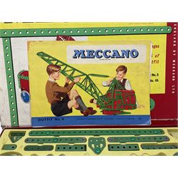 Meccano - Outfits 4, 6 & 7 with red and green parts; Outfits 4 & 6 virtually fully stocked and Outfit 7 containing large quantity of loose parts; Outfits 4 & 7 with instruction manuals; all boxed (3)