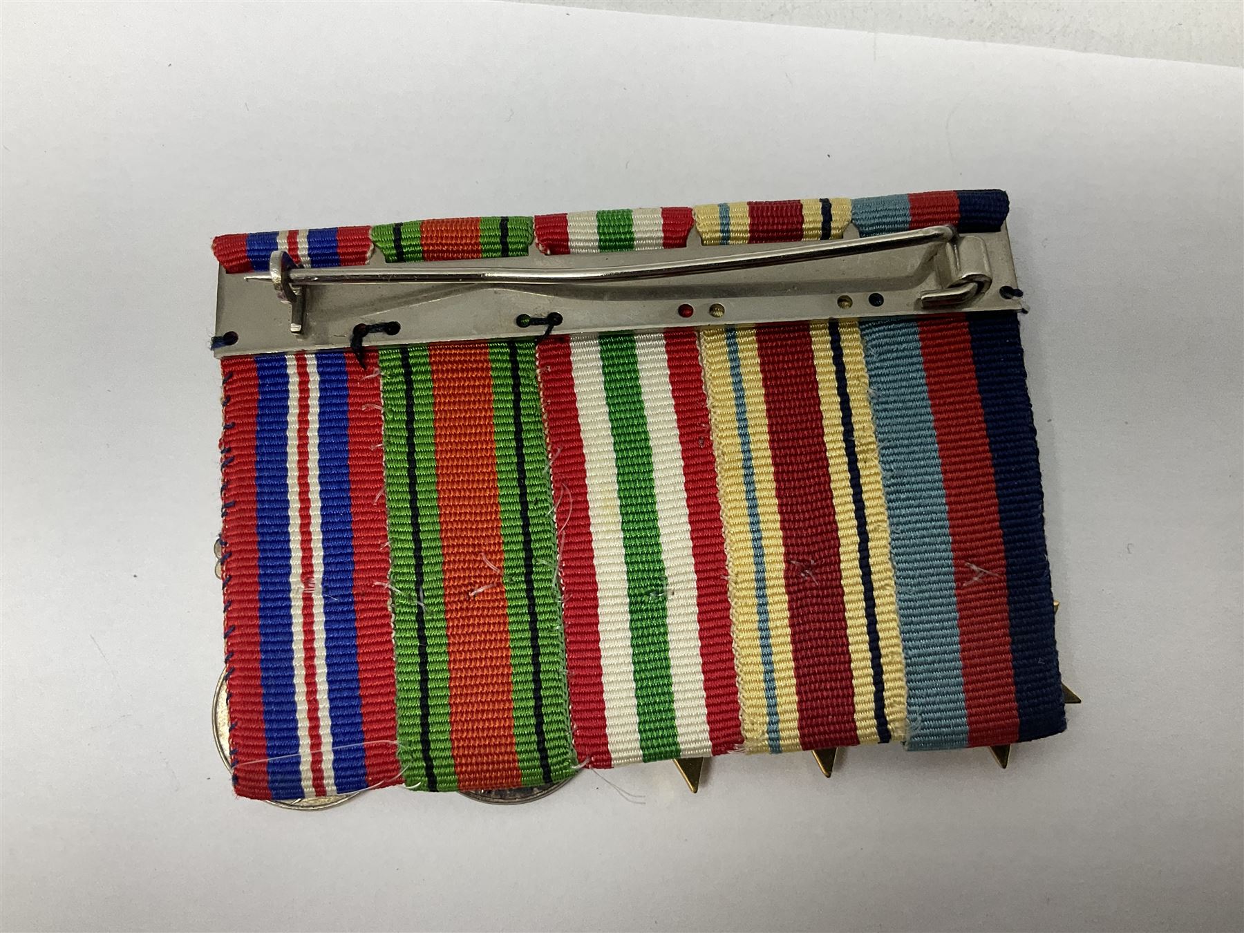 Gaunt & Son Territorial Force Nursing Service cape medal; cased; WW1 British War Medal and 1914-15 Star (names erased); two MID oak leaves; Polish and American medals; eight replica medals including VC, MM, Air Crew Europe Star etc and replica group of five WW2 miniatures etc