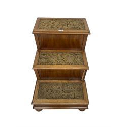 19th century mahogany step commode, pull-out action to reveal commode, the top with hinged lid, on turned feet